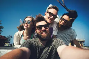 Group of Young People Smiling Taking Selfie