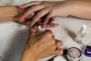 Manicurist Dipping Nails
